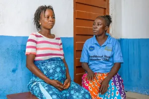 Two women sit together