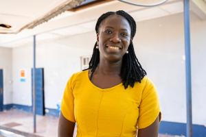 woman smiling looking towards the camera