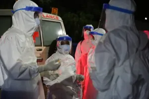 clinicians and sprayers prepare to receive patients 