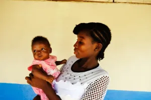 Woman holding a baby
