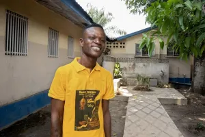 A portrait of a young man smiling