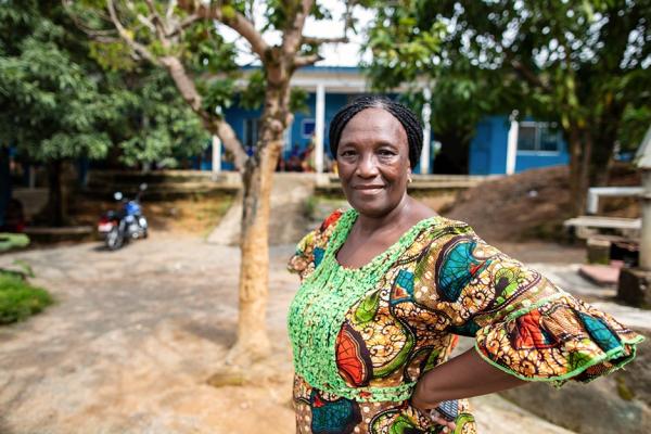 Woman standing infront of a clinic
