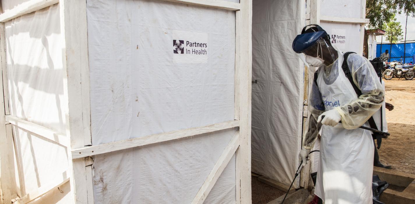 man in PPE at Ebola Treatment Unit
