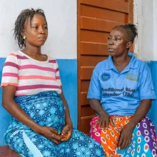 Two women sit together
