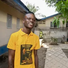 A portrait of a young man smiling