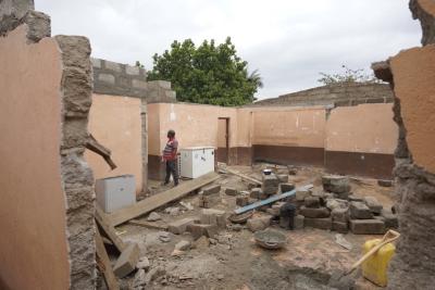 The walls of the health center being demolished for expansion