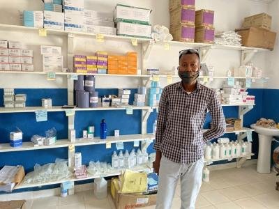 A man stands in the new pharmacy of the health clinic
