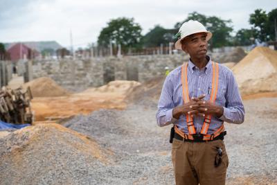 John Chew gives a tour of the Maternal Center of Excellence construction site on August 16, 2023.
