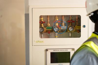 oxygen valves behind glass on the wall
