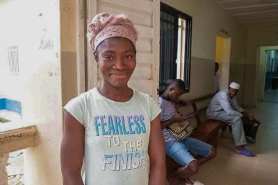 Girl standing infront of a clinic
