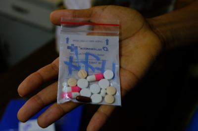 A small pouch containing medicine for the TB regimen
