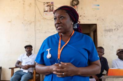 A clinician talks in front of people