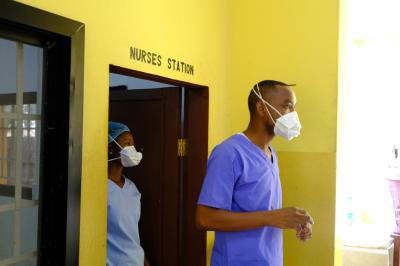 A doctor walks through the newly renovated inpatient ward at Lakka