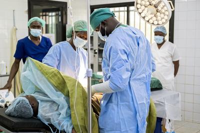 Doctors operate on a pregnant woman