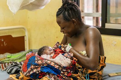 A new mother breastfeeds her baby